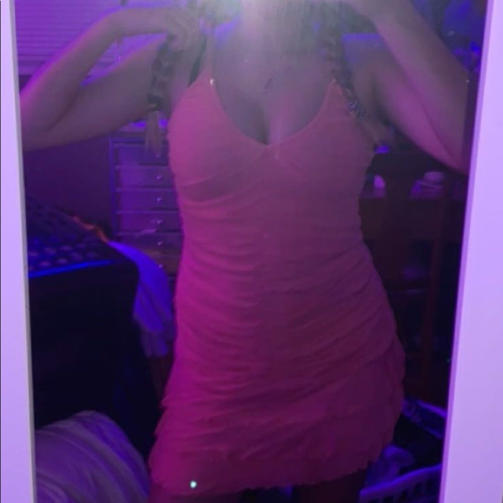 Tight pink ruffled dress
